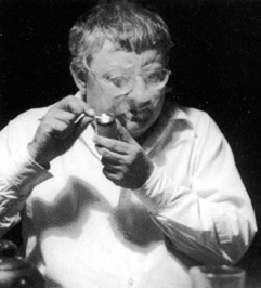 Guy Debord smoking a pipe